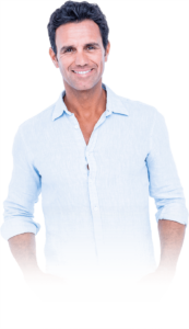 Male patient smiling after tooth extraction