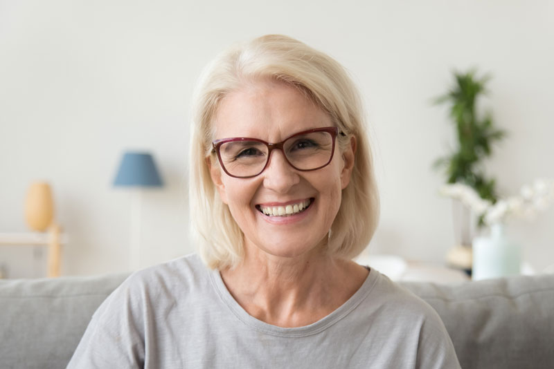 Dental Patient Smiling After Getting Dental Implants In Phoenix, AZ