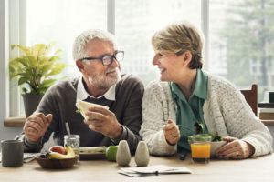 Dental Implant Patients Eating Together In Phoenix, AZ
