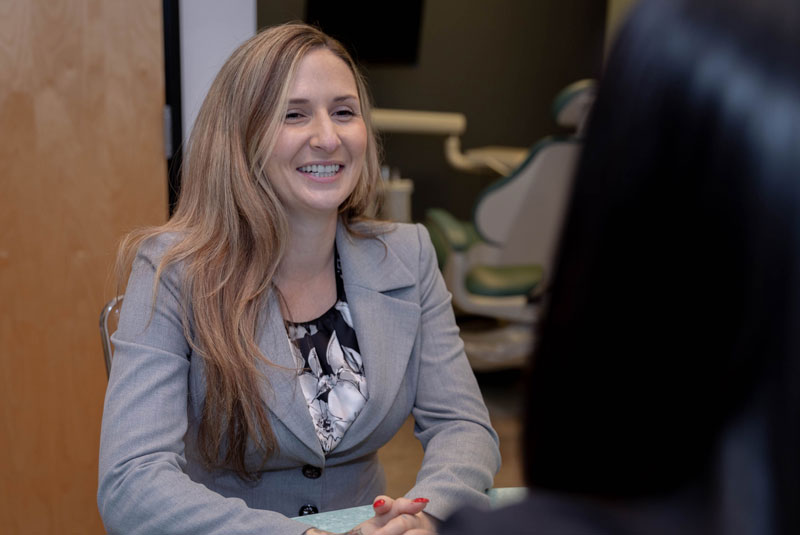 dental patient discussing treatment options