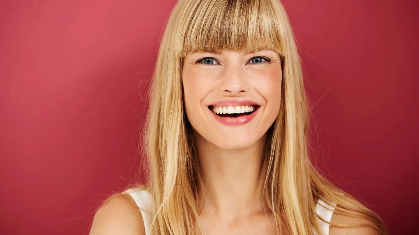 Women Smiling After Getting Multiple Dental Implant